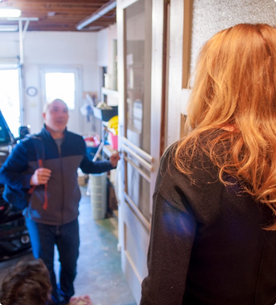 Family-Nesting-Bill-arriving-at-the-nest-with-Beth-greeting